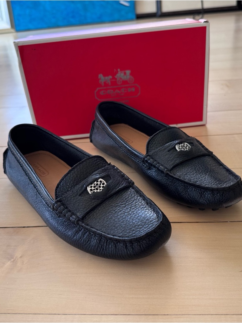 Coach Nicola Black Pebbled Leather Slip-On Loafers with Silver Accent